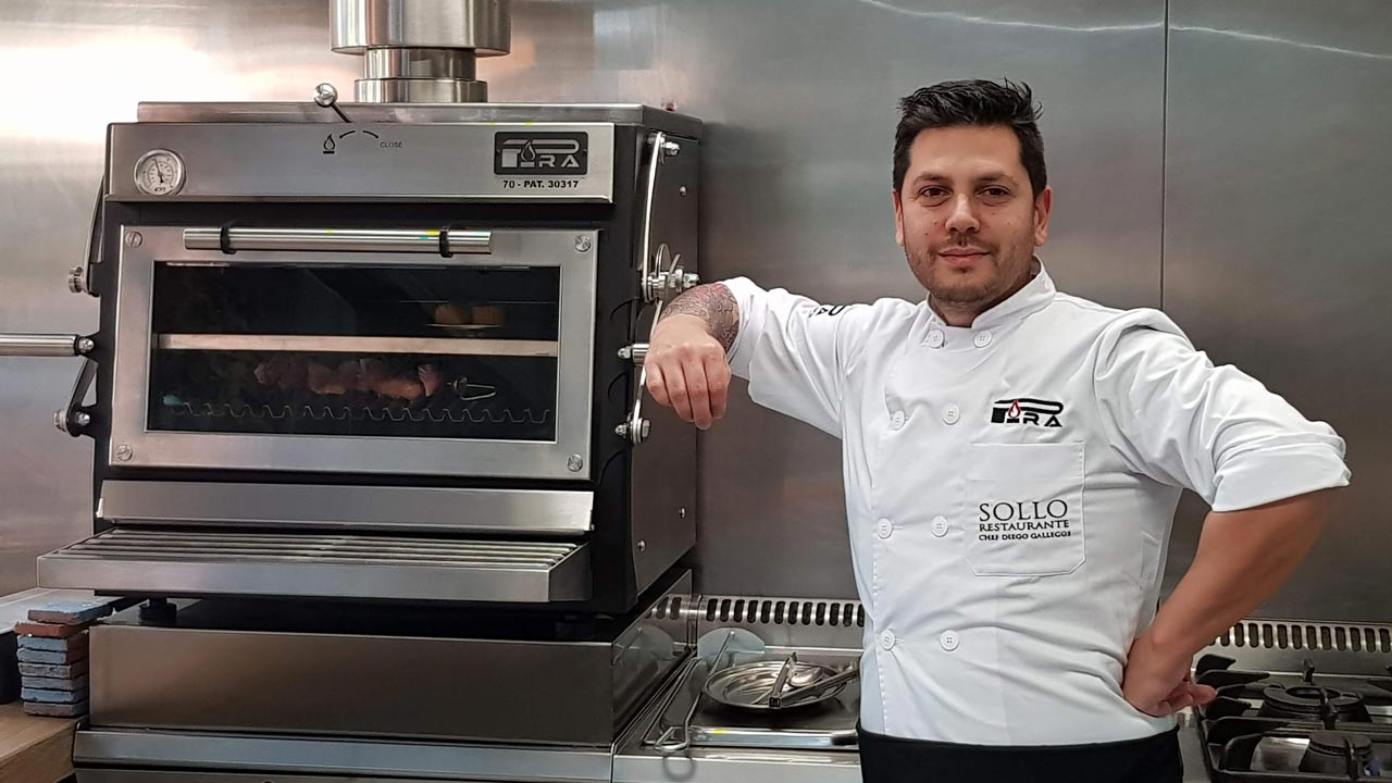 Diego Gallegos with its new Pira 70ED||caviar in a spoon|Diego Gallegos at Sollo with kitchen in background|Sollo restaurant with kitchen in the background and a nize landscape to the right|Diego Gallegos with the Pira 70ED charcoal oven.|Pira 70ED charcoal oven in the kitchen of Sollo by Diego Gallegos.